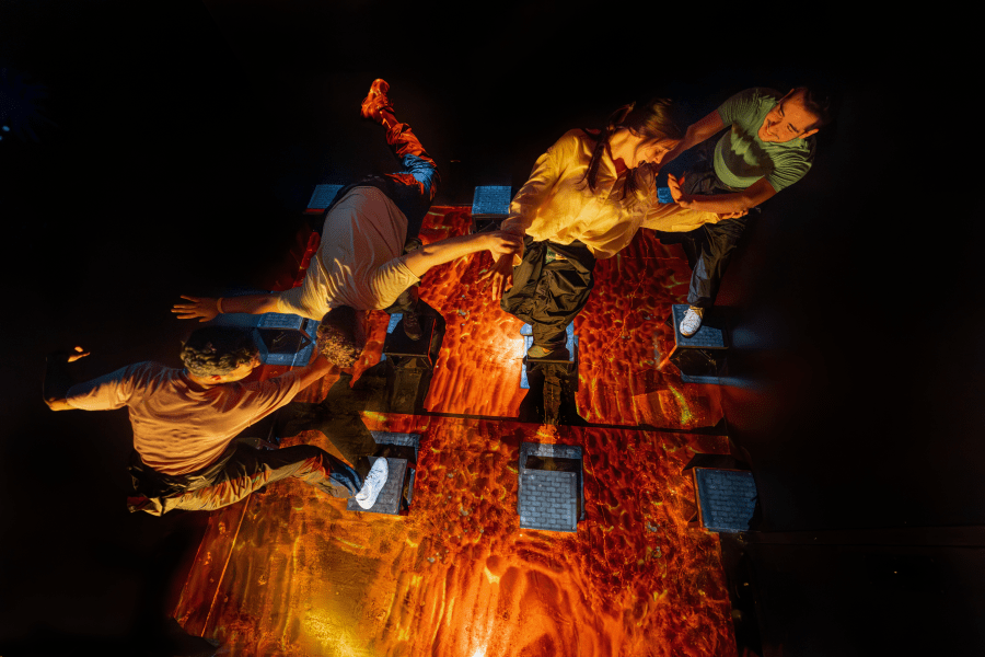 People playing The floor is lava above platforms.